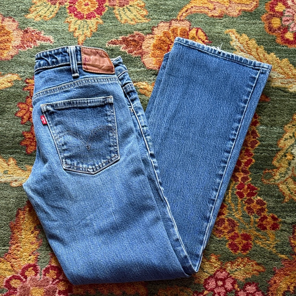 Levi's Denim size 29m with 2 cowboy Tan Patch